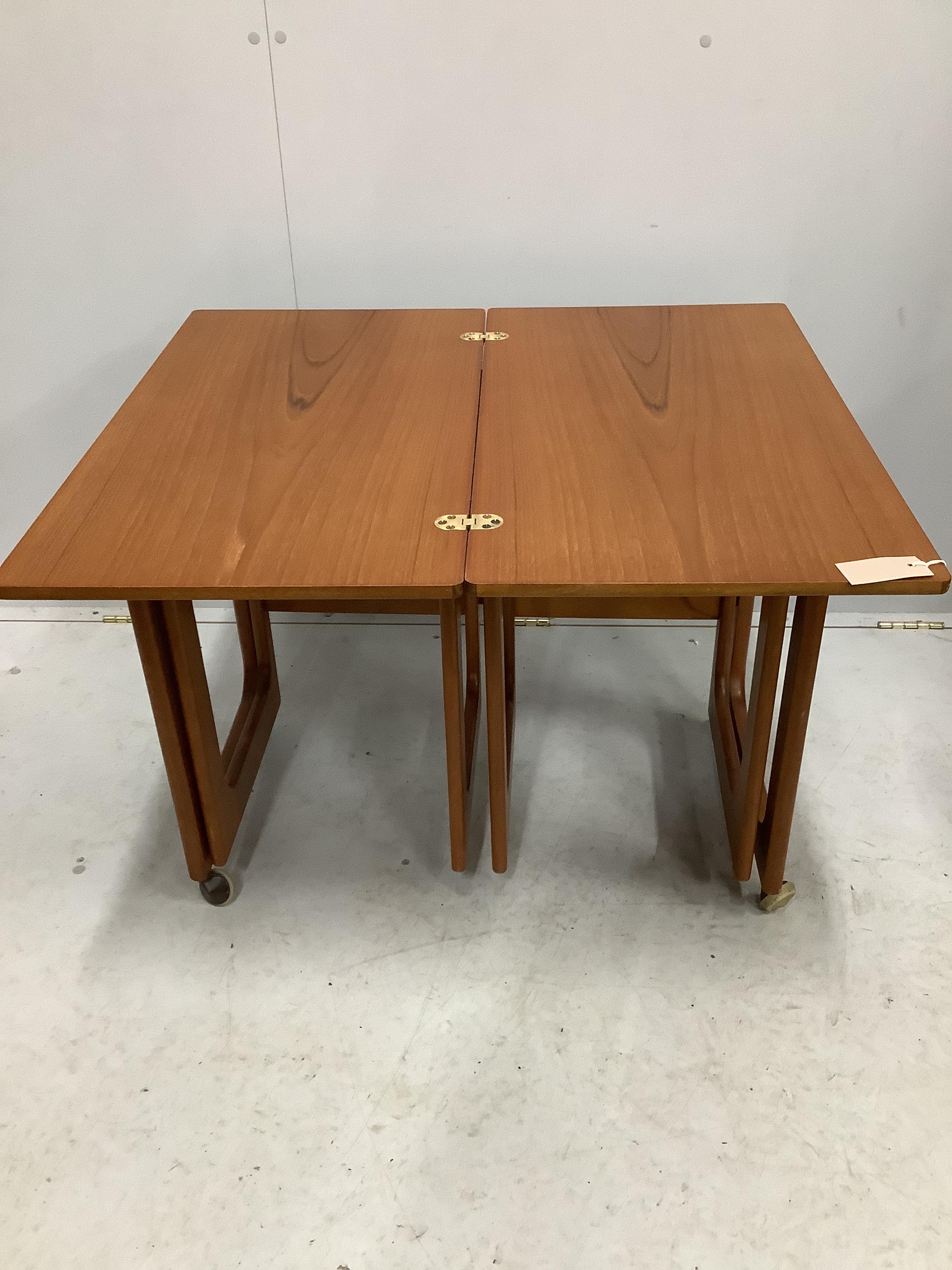 A McIntosh mid century teak triform nest of tables, width 74cm, depth 40cm, height 61cm